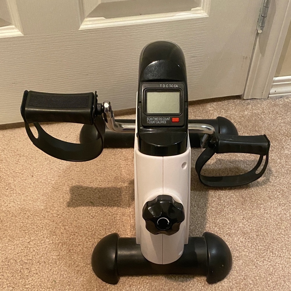 Compact Black and White Pedal Exerciser